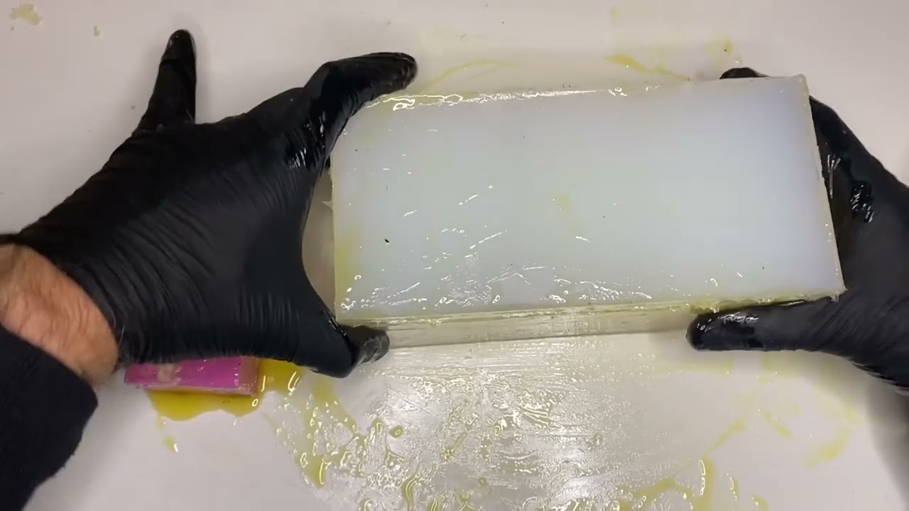 Resin casting a car body. Removing master from mould and pouring the resin.