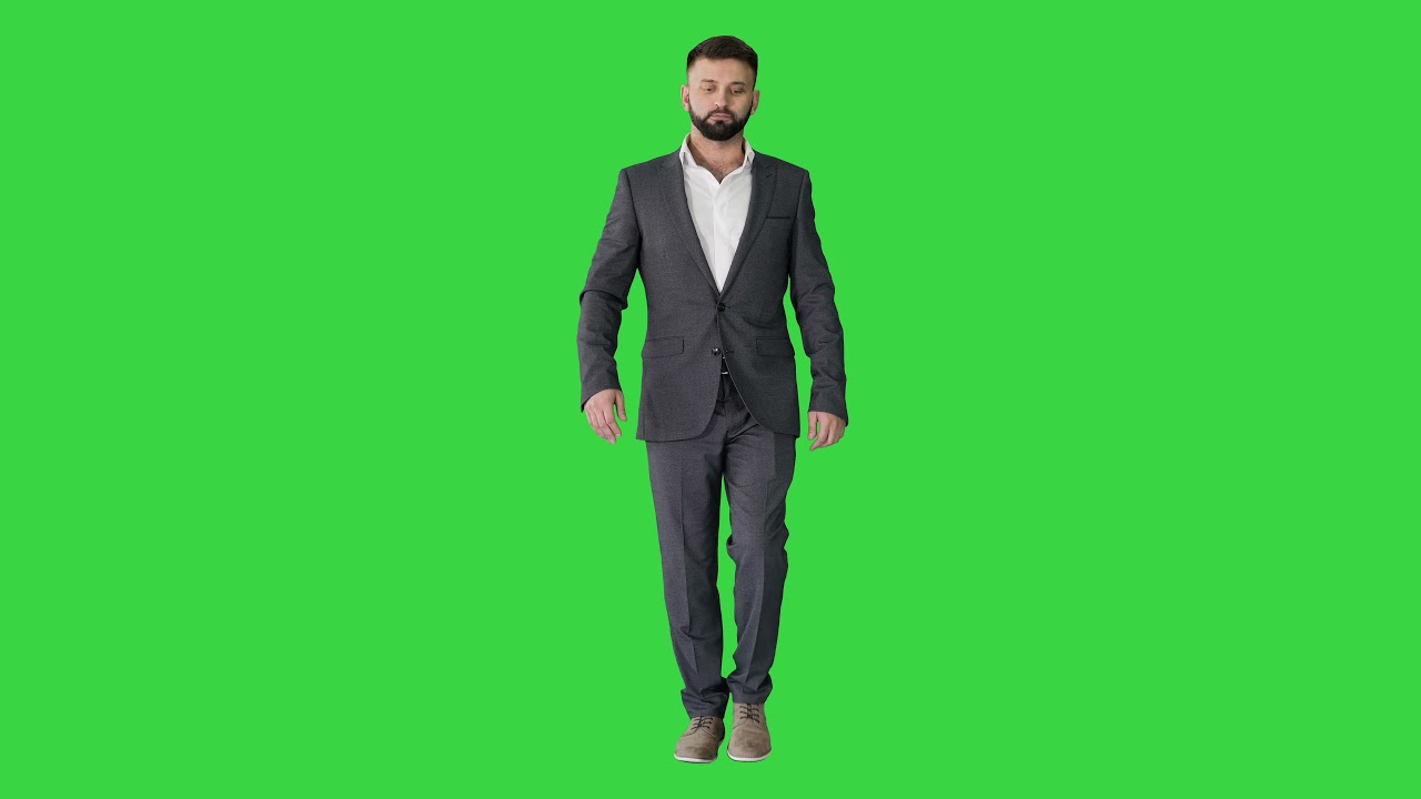 serious business man in formal suit green background - YouTube
