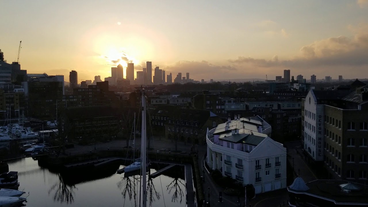 Sunrise over Canary Wharf, view from St Katherine Docks
