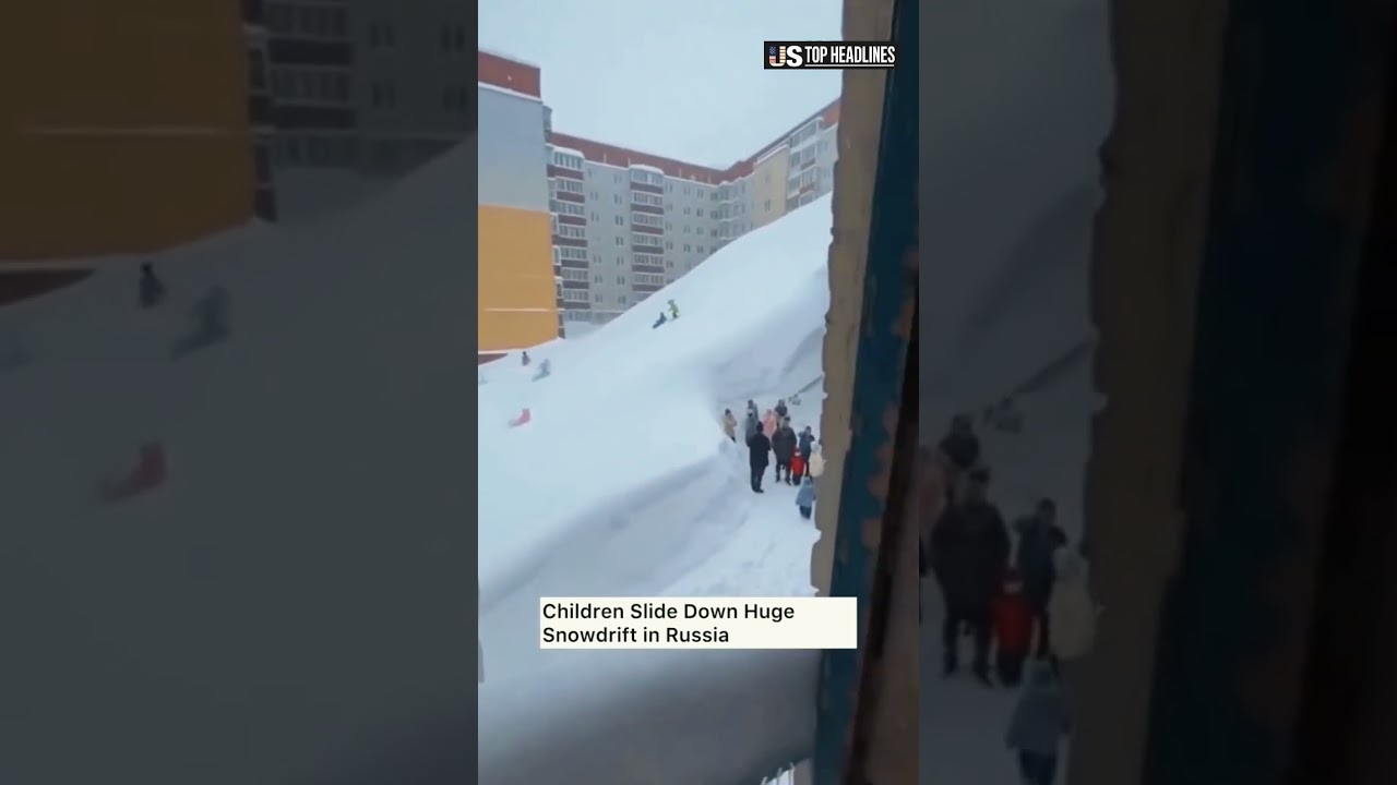 Kids Slide Down 10-Foot Snowdrifts in Russia 