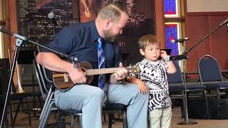 Marcus sings “Jesus loves me” in front of church at 3yrs old