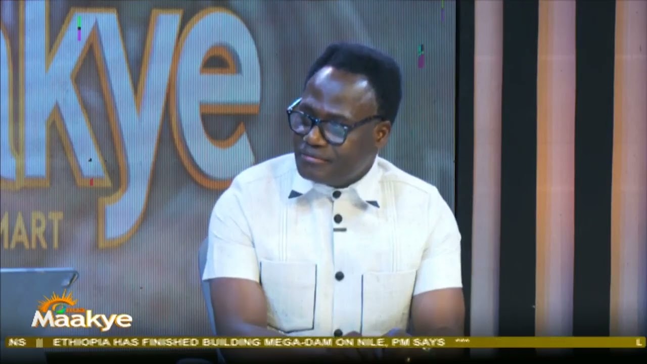 Captain Smart sits with Apostle Francis Amoako Attah