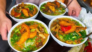 Noodles with crispy fried Fish 100kg per day popular local dish - Vietnamese street Food