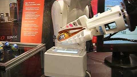 Denso 6 axis robot arm dances around egg CNC 3D printing factory automation