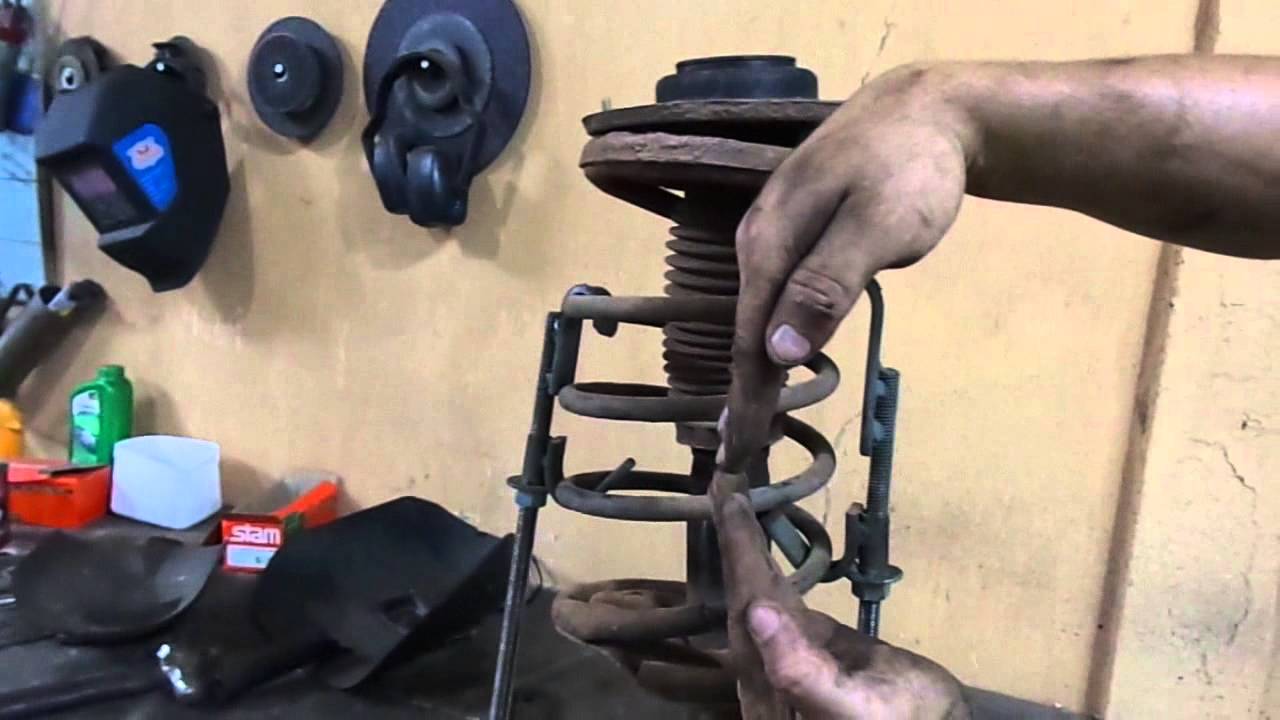 Troca dos Amortecedores Dianteiros do Peugeot 207 toda linha 206/207