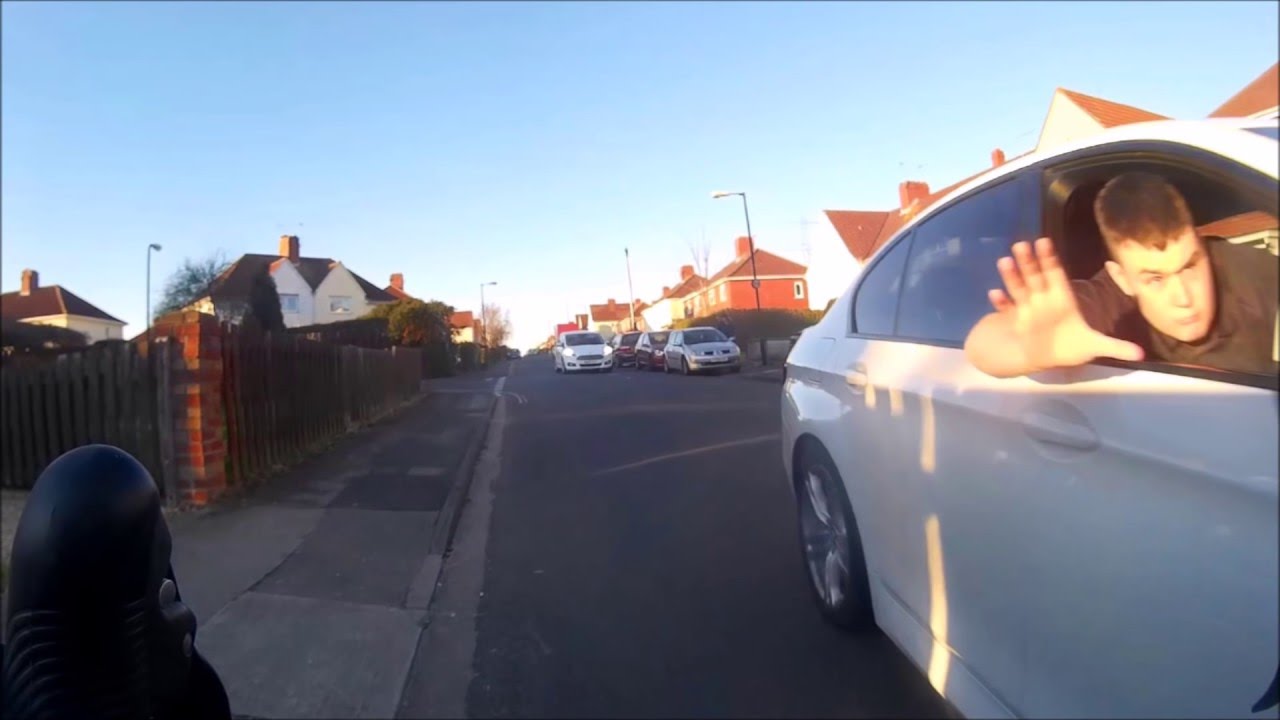 Driver Leans Out Of Car Window And Attempts To Push Cyclist Off Driver Leans Out Of Car Window And Attempts To Push Cyclist Off You