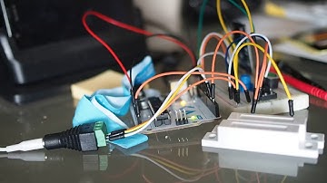 Door alarm system (Powered by Arduino / ATMega328P)