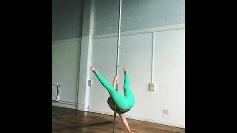 Pole handstand movements