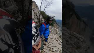 Parachutist Jump Amidst Cloudy Dolomites