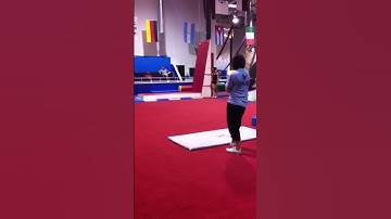 Front tuck step-out round-off back handspring tuck