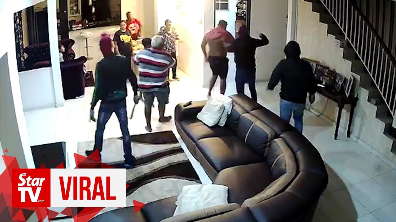Cops seeking armed home invaders seen in viral video - YouTube