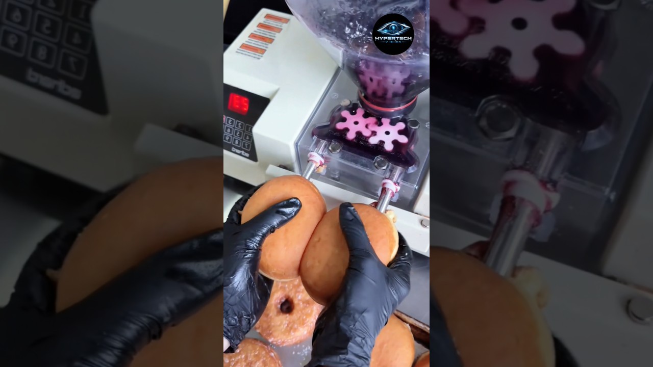 Watch Fast & Precise: The Ultimate Automatic Donut Filling Machine on YouTube Watch Fast & Precise: The Ultimate Automatic Donut Filling Machine on YouTube