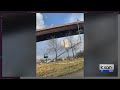 DURING & AFTER: KXAN camera captures tornado toppling metal poll