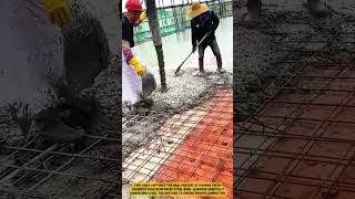 The process of pouring concrete mixture with a vibrator tool for reinforced flooring #shorts #work