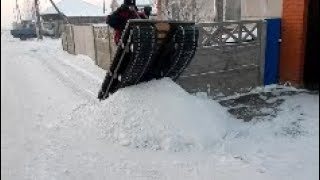 Бортоповоротный снегоход Сибирь