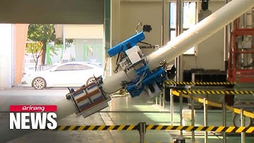 Checking safety of cable-stayed bridges with robot sensors