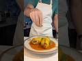 Stuffed peppers in tomato sauce