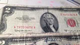 Star notes and red seal two dollar bills