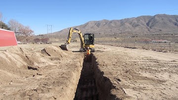 Digging A Trench by Operator Feria