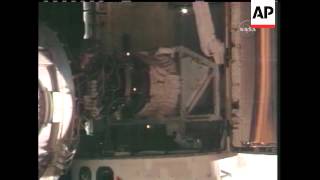 Space shuttle Discovery performed a slow back flip and then docked at the international space statio