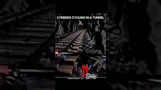 2 Friends Cycling In The Tunnel