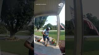 Amazon delivery driver fixes then salutes US flag