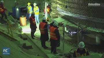 Mega bridge rotates into place in central China