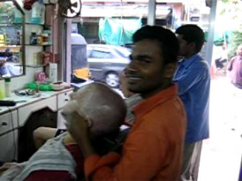 Here is a glimpse of what has become of our off day tradition. We go to the Milan, Italy certified Ganesh's Male "Saloon". Ganesh and his boys hook us up with haircuts (ya never know what you are going to get), a clean shaven face, and a head massage, though painful, is worth every tear and a few seconds of blurred vision. Definitely reason enough to come to India. (Blake is on the left getting the second half of the massage and Matt is sitting right getting the first half)