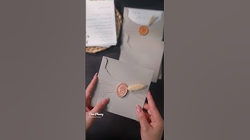 Mẫu thiệp kết hợp sáp, nơ và hoa #thiepcuoitrucphuong #wedding #weddinginvitation #trendingshorts