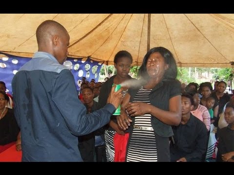 Pastor sprays Doom on congregants to 'heal them'