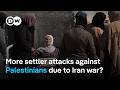 Israeli settler attacks on Palestinians amid Iran war | DW News
