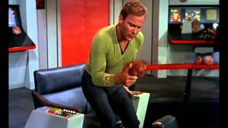 Captain Kirk sits on a tribble
