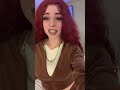 Confident Woman Raps Energetically in Velour Outfit#RapMusic #VelourFashion #RedHair