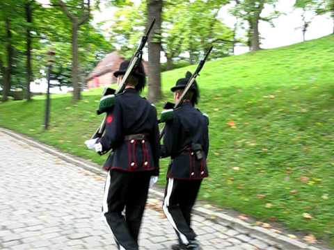 Two norwegian Royal Guard passing by on patrol at the Akershus Fortress.