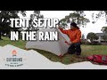 Setting Up A Tent In The Rain