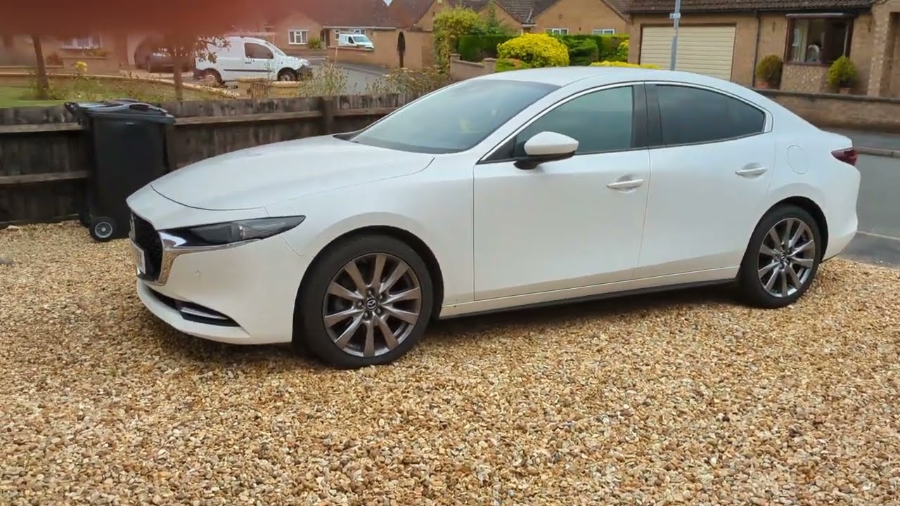 Mazda 3 saloon/fastback review 6 months