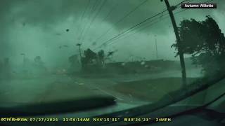 Dashcam captures Wisconsin driver trapped by downed power lines after tornado