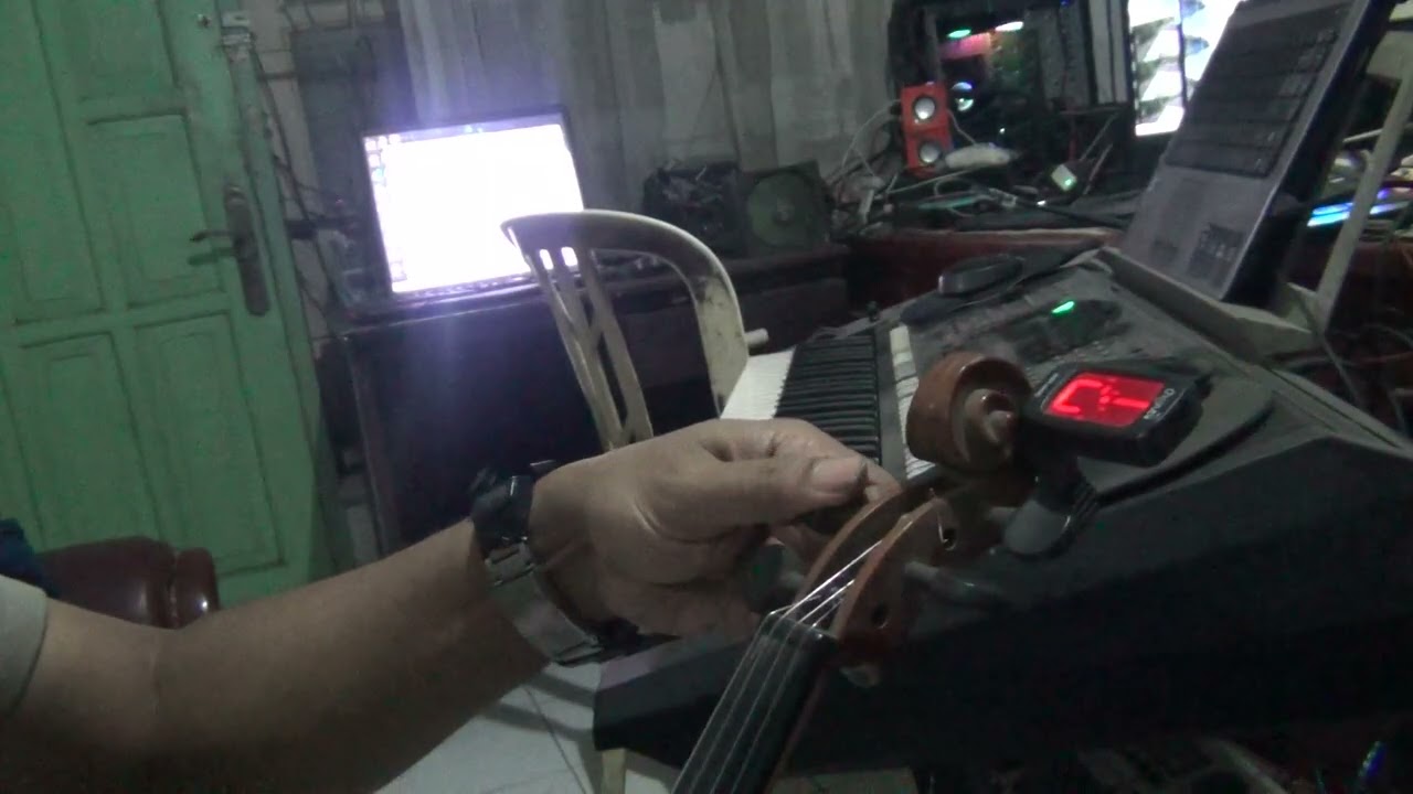 menyetem violin 1/2 dgn standar finger E,B,G,D