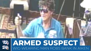 Armed wig-wearing suspect robs bank in Aiken County