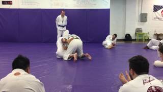Patrick rolling with Ryron Gracie
