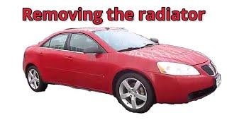 Taking The Radiator Out Of A 2008 Pontiac G6.