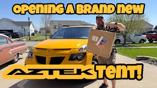 Opening a brand new Pontiac Aztek tent!