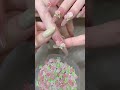 This spring-themed pink peach and rose nail art is so sweet! The complete set includes roses, green