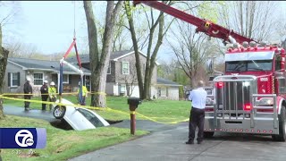 Sinkhole Swallows Vehicle In Bloomfield Township