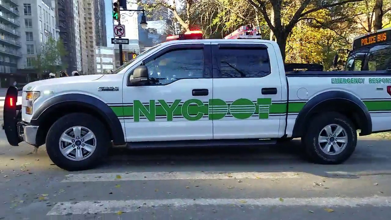 NYC Department Of Transportation Emergency Response Passing By On 59th Street In Manhattan, New