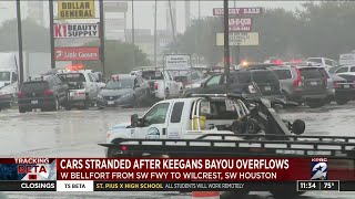 Vehicles stranded after Keegans Bayou overflows