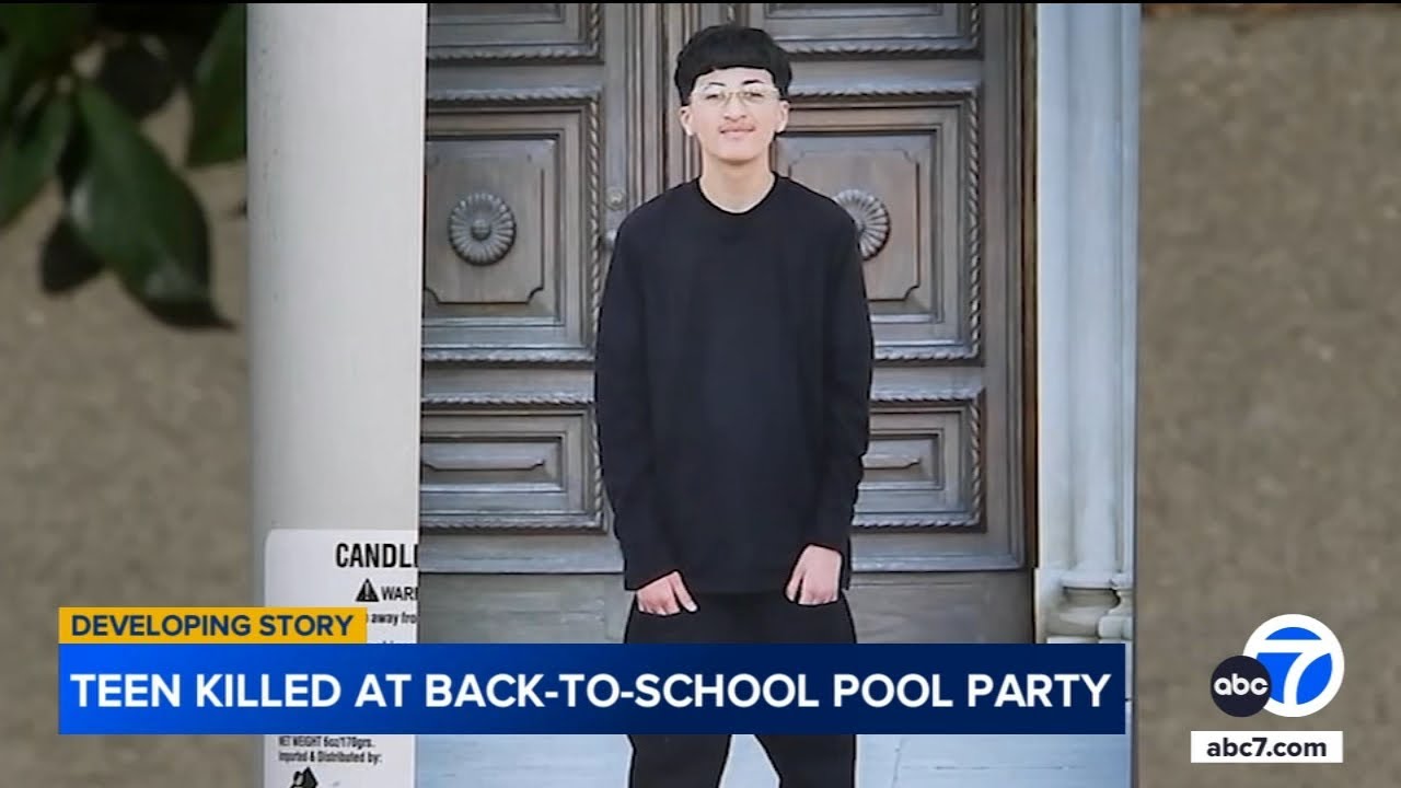 Person of interest spits at camera after teen killed at back-to-school party