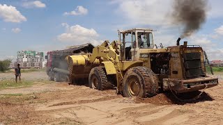 Incredible recovery!!! Big wheel loader pull out deep stuck in sand heavy load dump truck