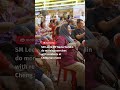 SM Lee & MP Nadia Samdin do morning exercises with residents at Cheng San event