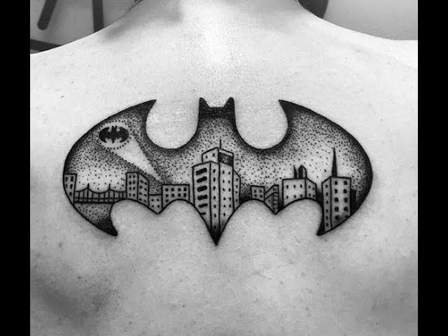 batman symbol arm tattoos